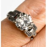 An Art Deco platinum and diamond ring, approximately 2.5cts diamond total, the brilliant cut diamond