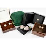 A pair of 18ct gold and pearl stud earrings, the pearls of pale pink lustre, 0.91g, a pair of 9ct