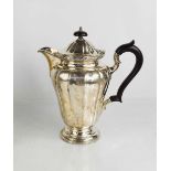 A silver coffee pot, London 1906, 17.80toz