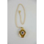 A 9ct gold locket pendant and necklace, 5.15g