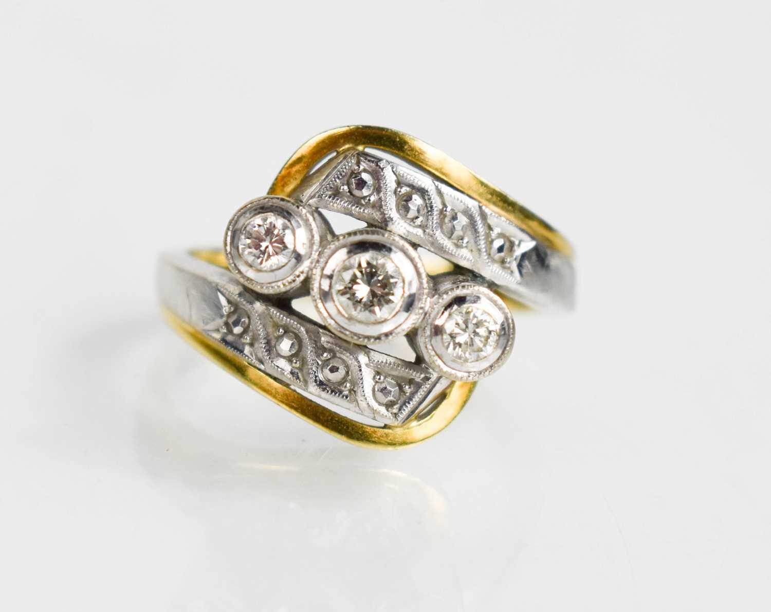 A 14ct gold, platinum and diamond ring, the three central diamonds in raised settings, 7.25g. - Bild 3 aus 3