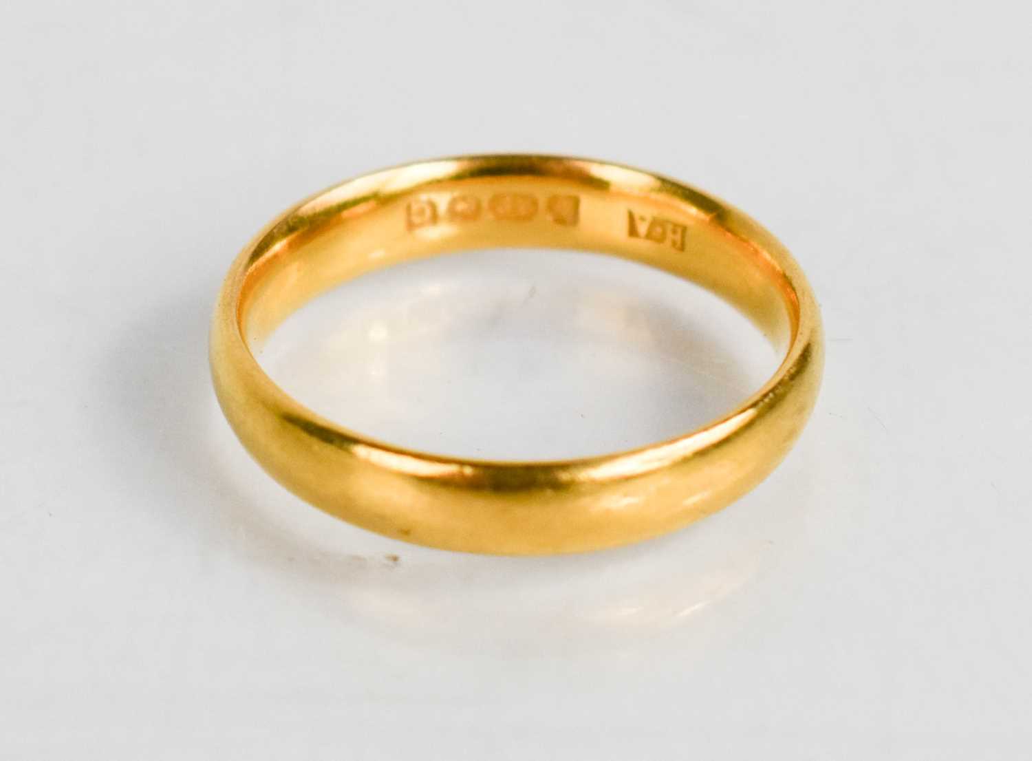 A 22ct gold wedding band, size N, 4.44g.