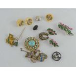 A group of Jewellery to include a Weiss flower brooch and earring set, silver brooch, hat pin and