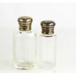 Two Asprey's silver topped cut glass dressing table bottles, each monogram engraved 'I.O.M.' the