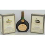 Two bottles of Hine rare and delicate fine champagne cognac together with a bottle of Cadegnan