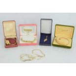 A group of 9ct gold comprising a bracelet 4.28g, 18.5cm long and a '18' key pendant on fine chain,