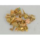 A 9ct gold charm bracelet, 97g.