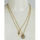 Two 9ct gold necklace, one with a cruciform pendant, the other of oval form in yellow, white and