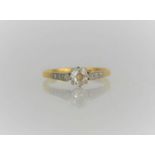 An 18ct gold, platinum and diamond solitaire ring, 2.35g, size N