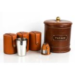 A leather clad tobacco jar, and four sets of huntsmans toddy glass canisters, three with belt