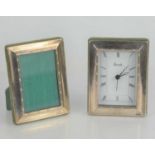 A Harrods desk clock with silver frame together with a Harrods silver picture frame.