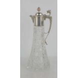 A silver topped cut glass claret jug of hobnail design, the silver mount with griffin thumbplate,