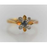 An 18ct gold sapphire and diamond ring in a flower set, 2.5g, size N