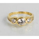 A Clogau 14ct gold and cubic zirconia three stone ring, size P, 3.6g.