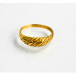 A gold (indistinctly hallmarked) ring, size R, 3g.