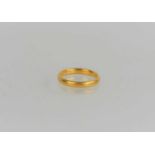 A 22ct gold wedding band ring, 3.37g, size k 1/2