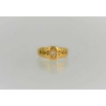 An 18ct gold and diamond starburst ring with laurel leaf decoration, 4.3g, size O 1/2