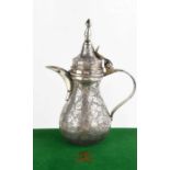 An Indonesian silver teapot, of baluster shape, stamped 925, 17cm high, in a green velour case.