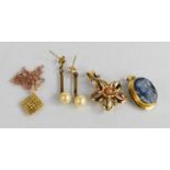 An 18ct gold cameo brooch, together with a 9ct gold flower form pendant, a 14ct gold pendant, and