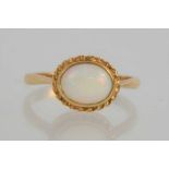 A 9ct gold and opal oval ring, 2.4g, size O 1/2