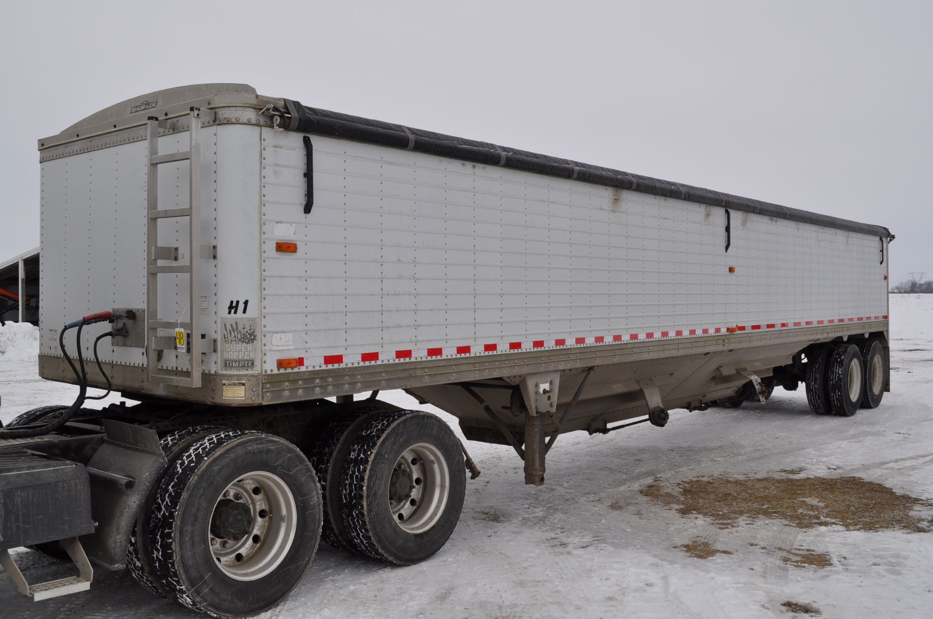 1993 42’ Timpte hopper bottom trailer, spring ride, 11R24.5 tires, roll tarp, VIN H42221PB084815