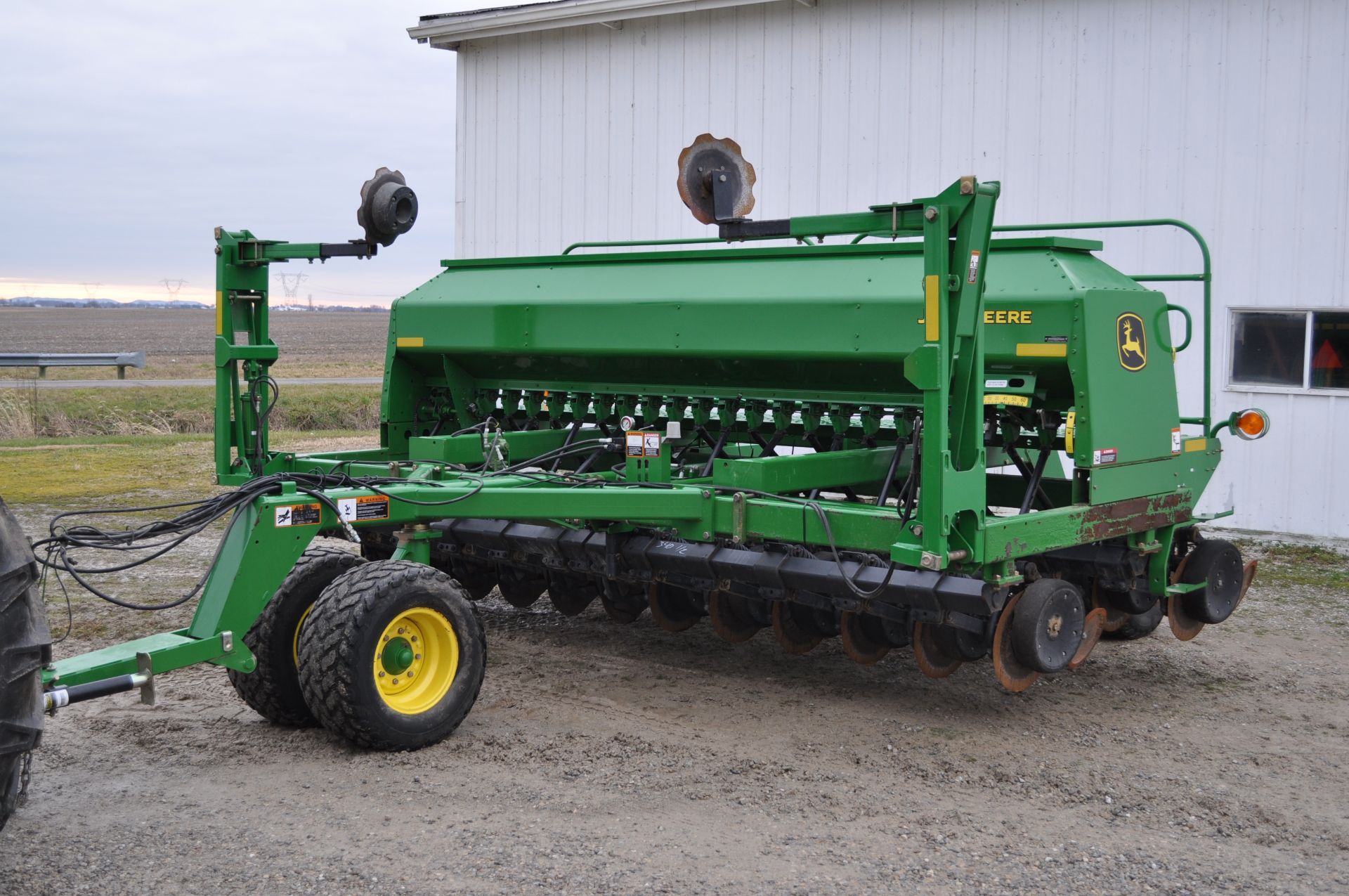 15’ John Deere 1590 grain drill, front dolly wheel, 7 ½” spacing, markers, lights, electric adjust