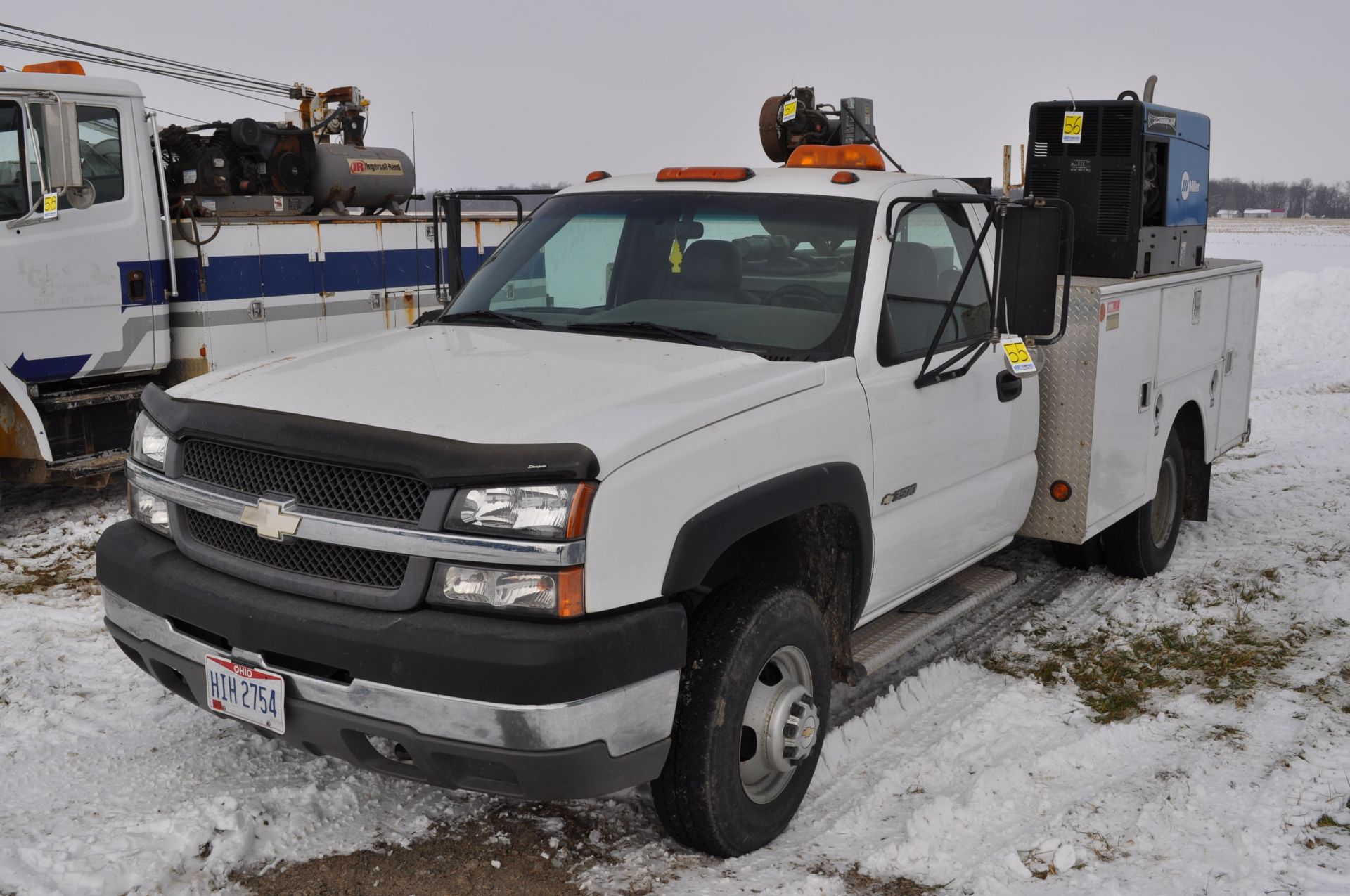 2003 Chevy 3500 service truck, standard cab, V-8 gas, automatic, 4x4, DRW, 42,206 miles, 9’ Stahl