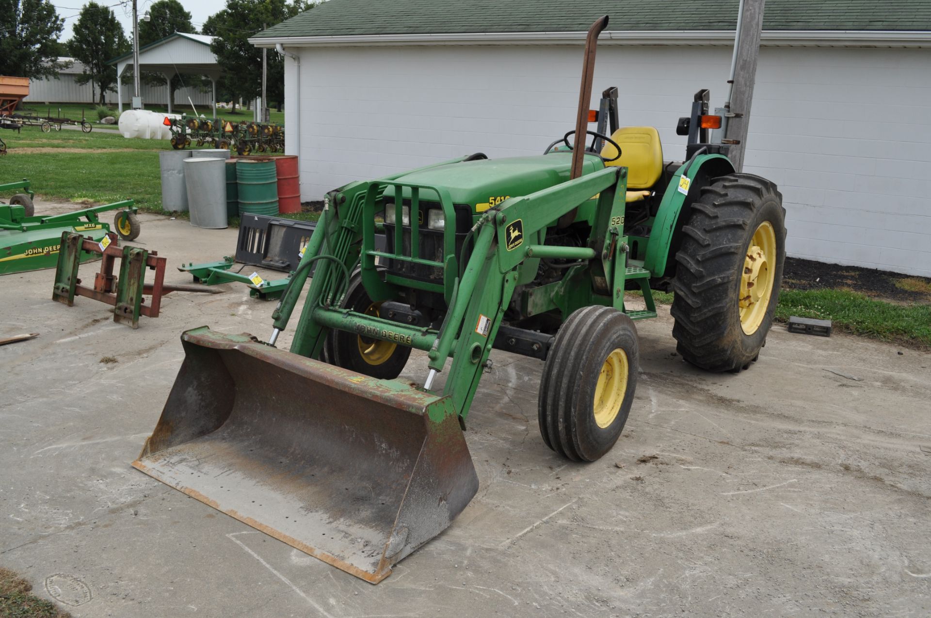 John Deere 5410 tractor, 2WD, w/ 520 loader, 16.9-30 rear tires, 11 L 15.5 front tires, 4090 hrs