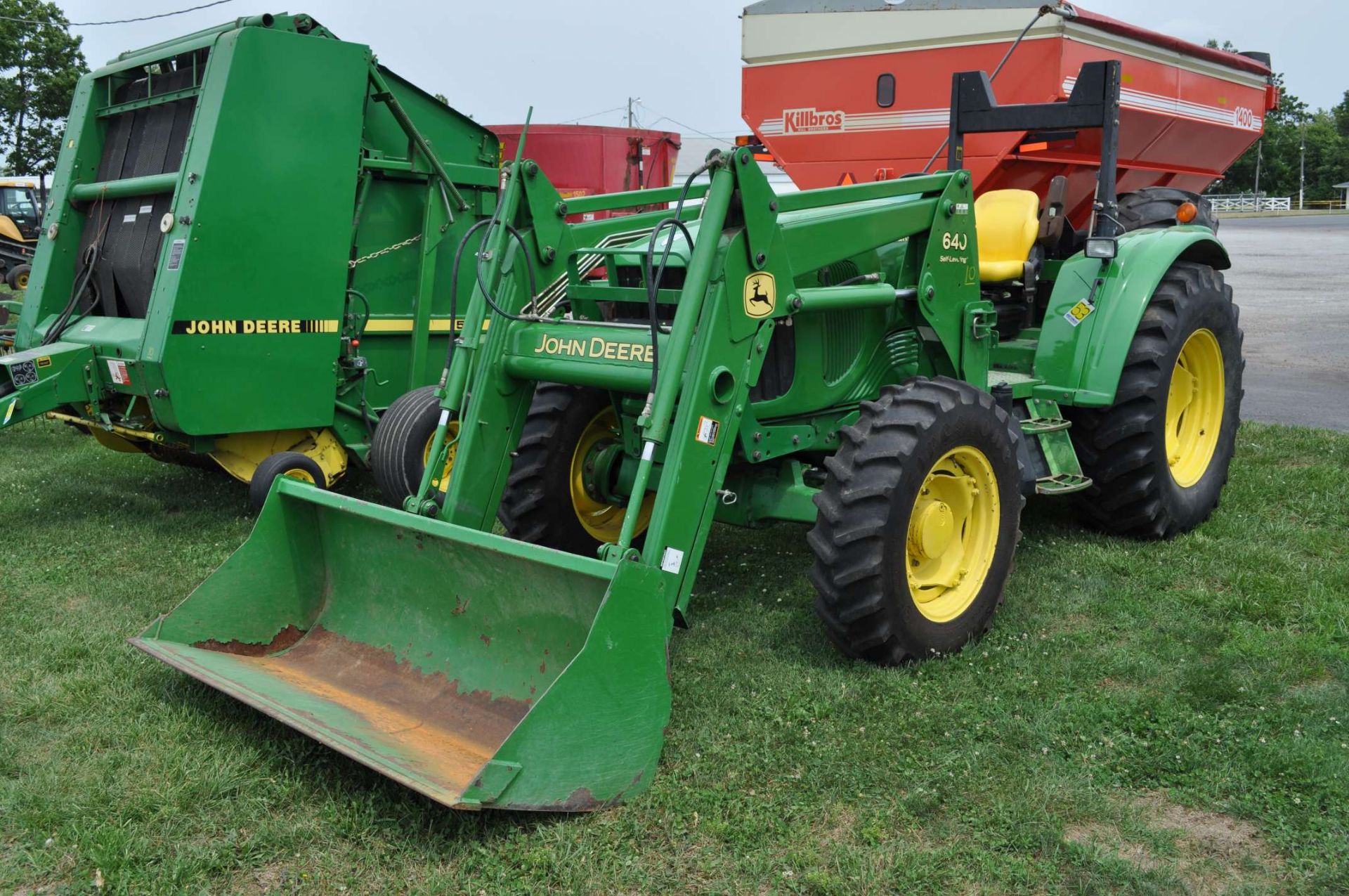 John Deere 6420L MFWD tractor w/ JD 640 self-leveling loader, shows 3648 hrs