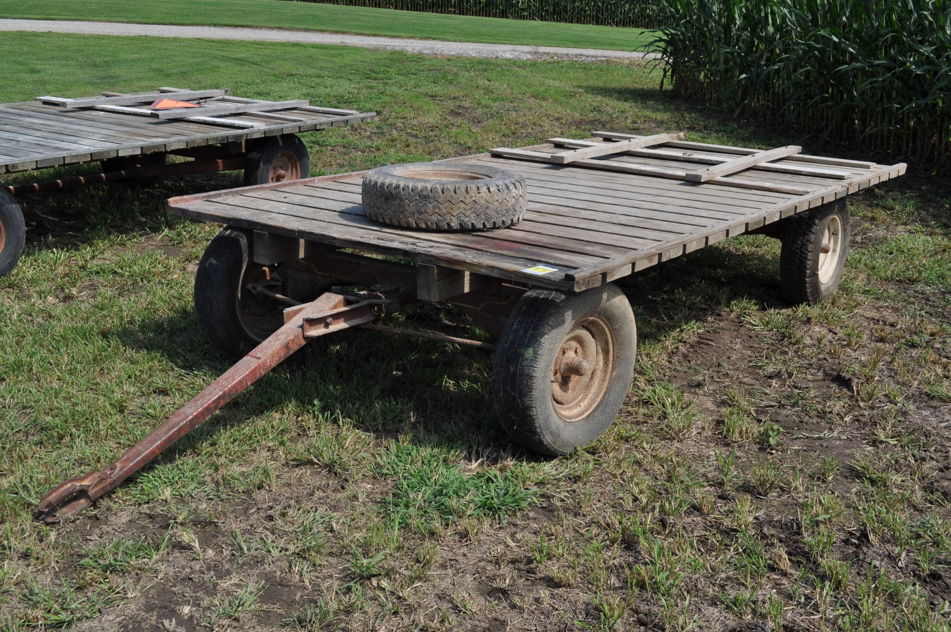 14’ x 7’ flat rack hay wagon, Montgomery Ward 3000 gear, 15” tires