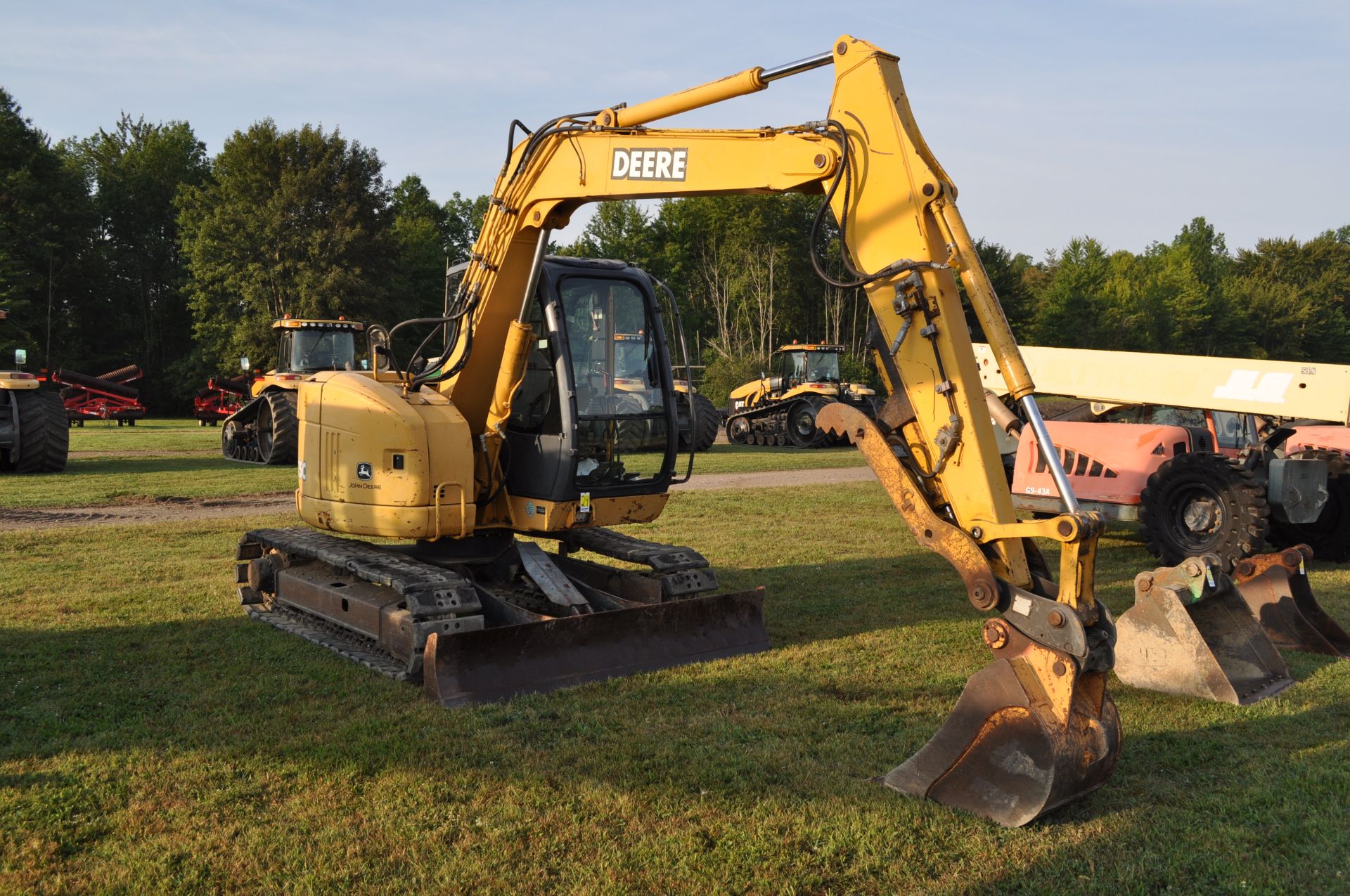 John Deere 75C excavator, 18” rubber pads, C/H/A, 8’ blade, 4' smooth bucket, manual coupler