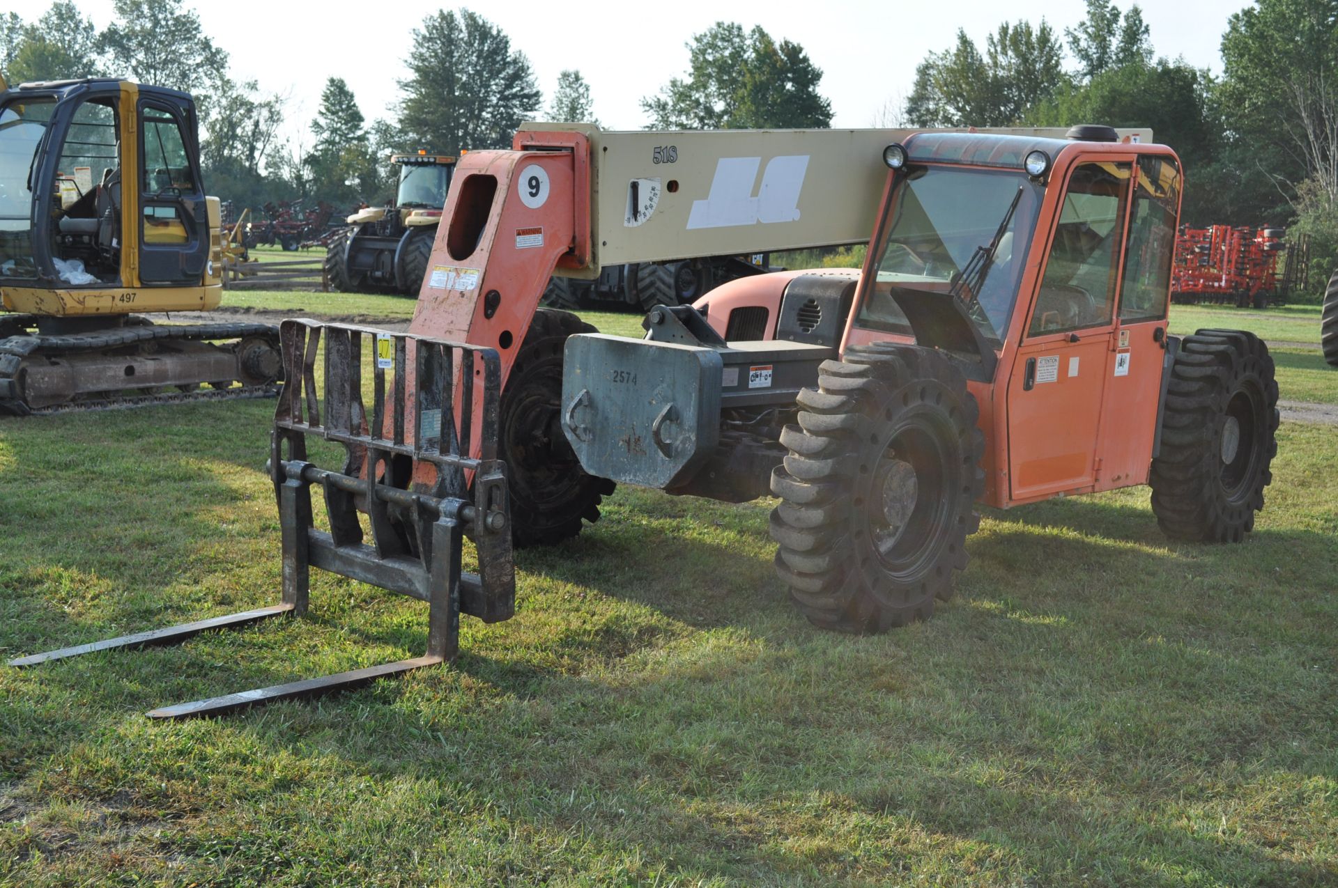 JLG G9-43A telehandler, 4x4, Perkins diesel, all wheel steer, 13.00-24 solid tires, cab, 7441 hrs