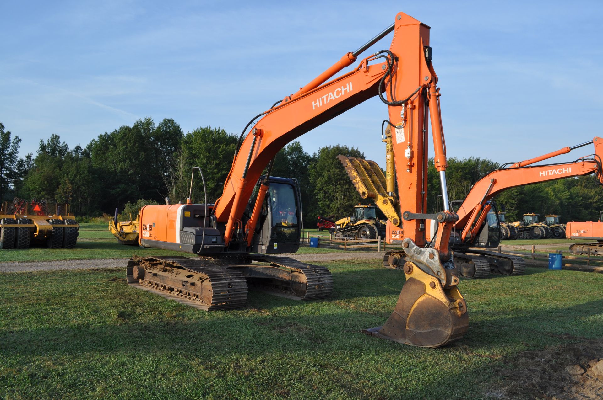 Hitachi 200LC excavator, 32” steel pads, C/H/A, JRB hyd coupler, 25" rock bucket w/ duckbill