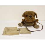 An Unusual Steiff straw filled mohair dog soft toy, possibly a pug, with button ear and leather