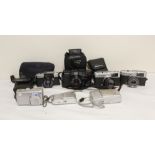 Selection of vintage film and digital cameras to include two digital Olympus cameras, two Olympus