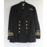 British Royal Navy dress uniform jacket having McMillen Stage Costumes label, brass naval buttons by