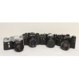 Four vintage Zenit cameras to include EM Olympic edition with Helios-44M F2 58mm M42 lens and a