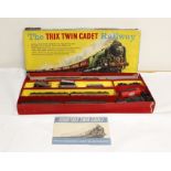 Box of engines & rolling stock in a Trix Twin Cadet Railway box. Some original Trix components but