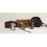 Three vintage 8mm and 16mm movie cameras, to include Revere 16 magazine camera, Kodak Brownie 8mm