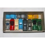 Dinky Toys diecast model vehicles including 40A Riley, 40b Triumph saloon car, Chrysler saloon