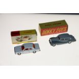 Two Dinky Toys diecast model vehicles; 150 Rolls Royce Silver Wraith with two-tone grey body and
