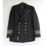 British Royal Navy dress uniform jacket having brass naval buttons by Kenning of London, "Wavy Navy"