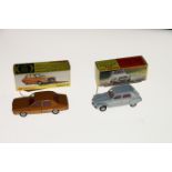 Two Dinky Toys diecast model vehicles; 1413 Citreon Dyane car with off-white body and 1424 Renault