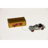 Dinky Toys diecast model vehicle 108 MG Midget Sports car with cream body, maroon interior, red