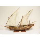 Wooden model of a Xebec three masted Mediterranean sailing ship.