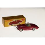 Dinky Toys diecast model vehicles 101 Sunbeam Alpine Lotus touring car with cerise deep pink body,