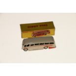 Dinky Toys diecast public transport vehicle 281 Luxury Coach with cream body and hubs and orange