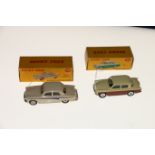 Two Dinky Toys diecast model vehicles; 168 Singer Gazelle saloon car with brown lower body and cream