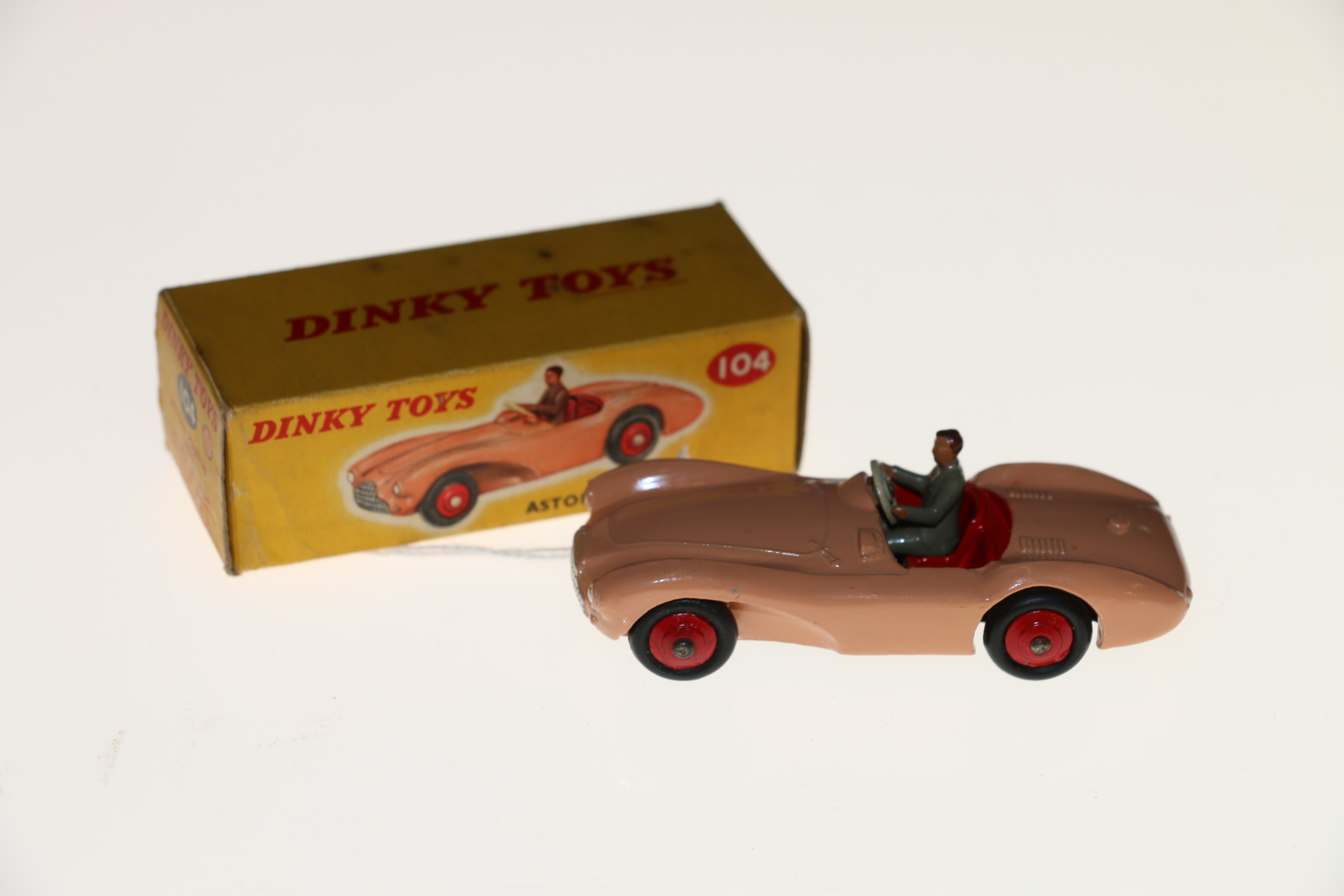 Dinky Toys diecast model vehicles 104 Aston Martin DB3S touring car with salmon pink body, red