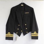 British Royal Navy dress uniform jacket having Gieves label, brass naval buttons by Gieves,